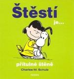 Kniha: Štěstí je...přítulné štěně - Charles M. Schulz